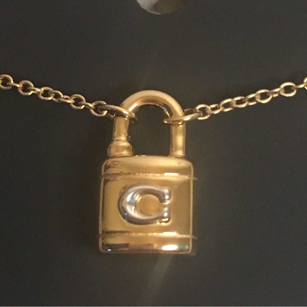 Coach Gold Bracelet with Lock Charm